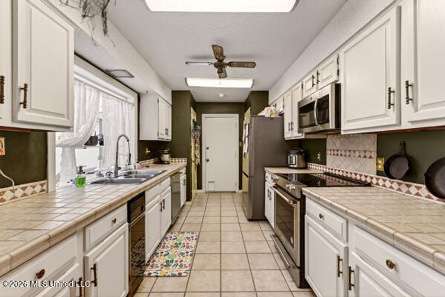 7928 Apaki Place, Diamondhead, MS 39525