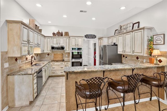 9668 LEEWARD SLOPES DR, Lakeland, TN 38002