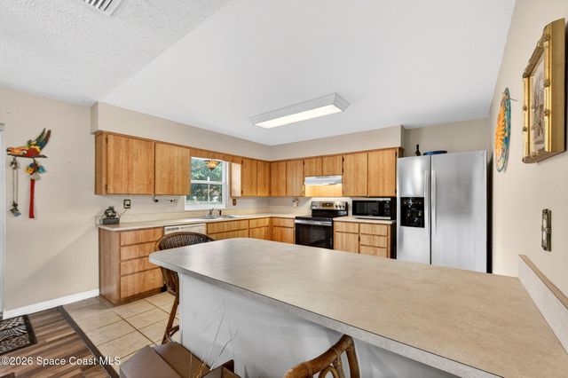 6033 Palm Street, Mims, FL 32754