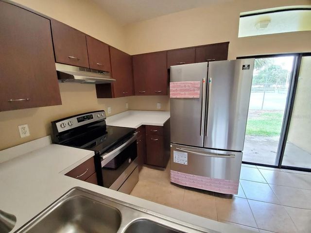 6001 SCOTCHWOOD GLEN 27, Orlando, FL 32822