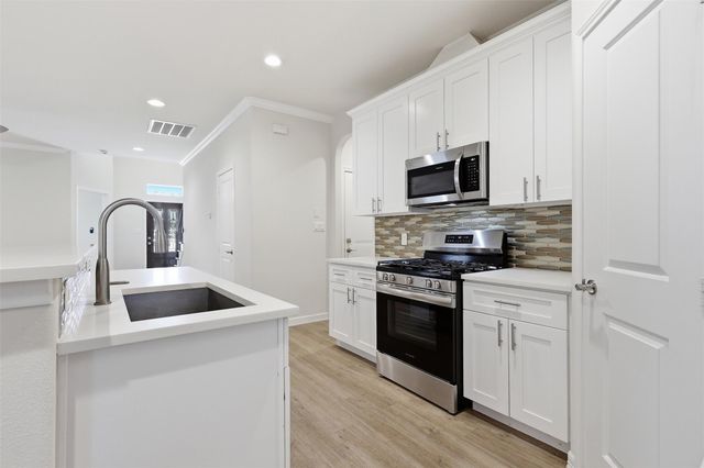 9738 Champion Heavens Drive, Spring, TX 77379