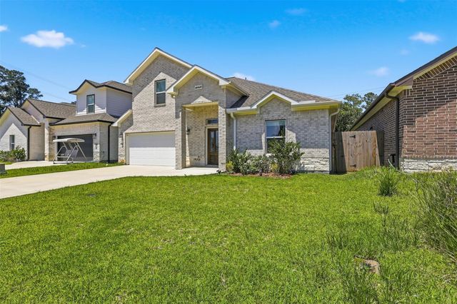 9738 Champion Heavens Drive, Spring, TX 77379