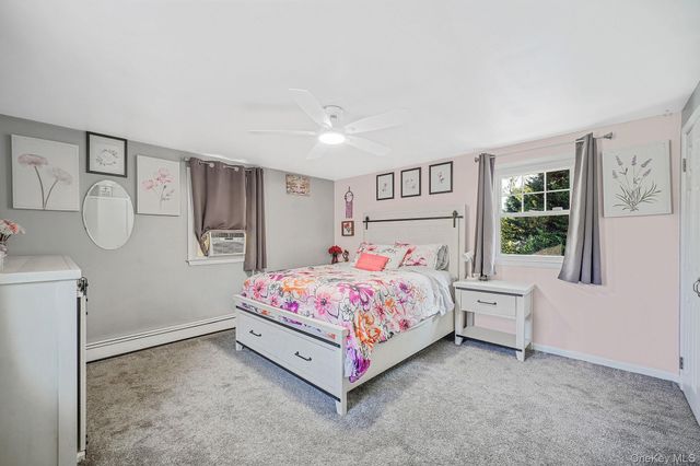 6 Cedar Oaks Avenue, Farmingville, NY 11738