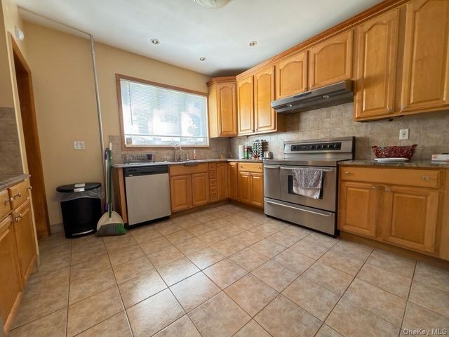 75-35 60th Place, Glendale, NY 11385