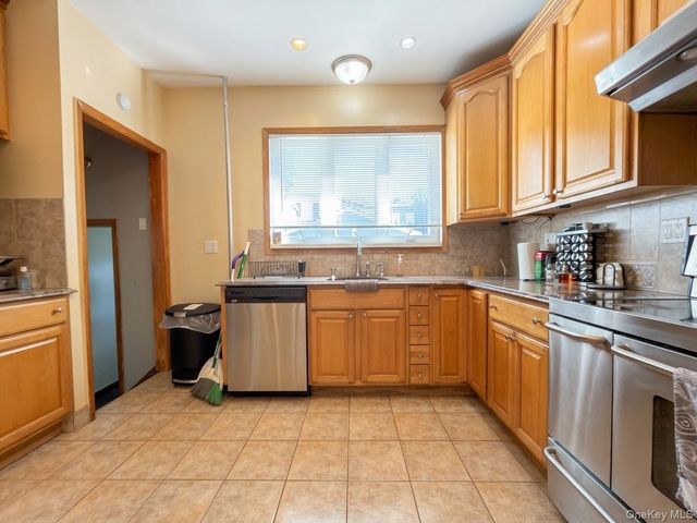 75-35 60th Place, Glendale, NY 11385