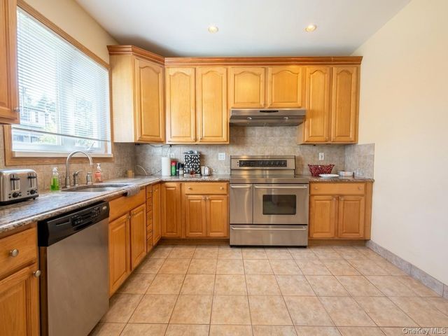 75-35 60th Place, Glendale, NY 11385
