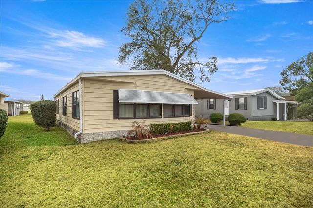 708 COACHMAN DRIVE, Leesburg, FL 34748