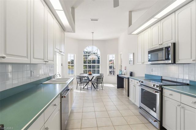 11283 LONGSHORE WAY E, Naples, FL 34119