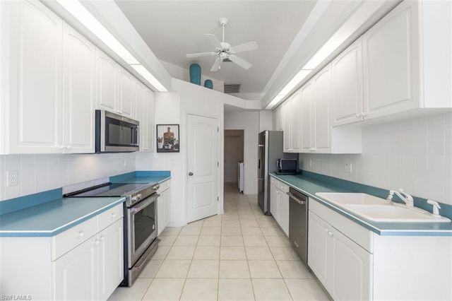 11283 LONGSHORE WAY E, Naples, FL 34119