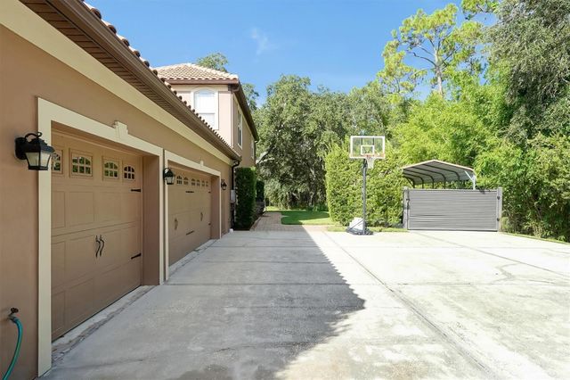 12012 RAMBLING OAK BOULEVARD, Orlando, FL 32832