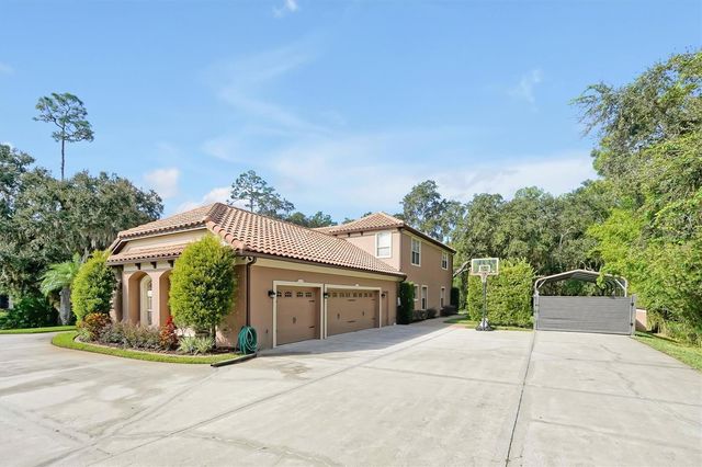12012 RAMBLING OAK BOULEVARD, Orlando, FL 32832