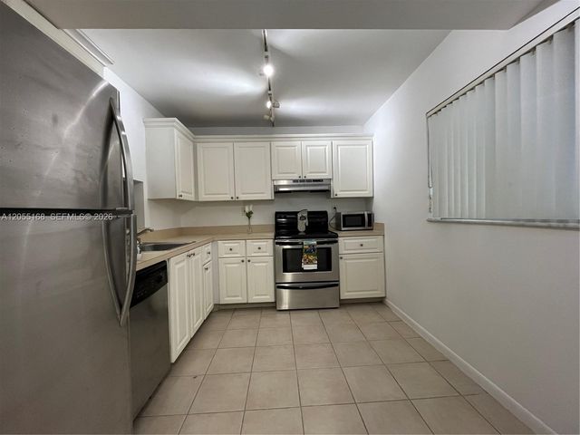 701 N Pine Island Road 202, Plantation, FL 33324