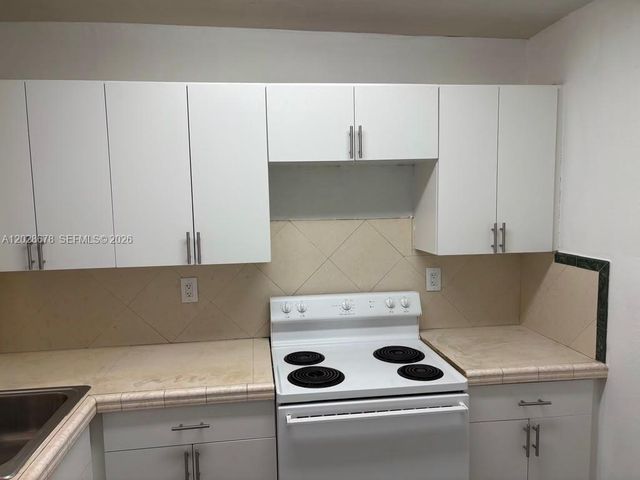 492 NW 165th St Road C211, Miami, FL 33169