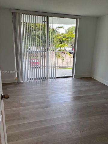 492 NW 165th St Road C211, Miami, FL 33169