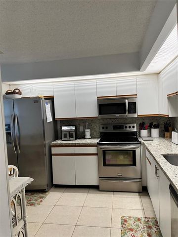 12950 SW 13th Street 211d, Pembroke Pines, FL 33027