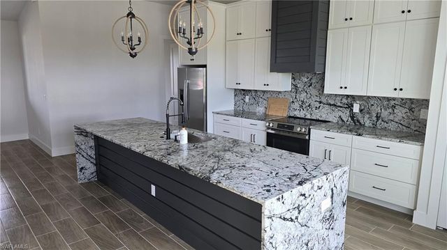 385 Paulcrest AVE, Lehigh Acres, FL 33974