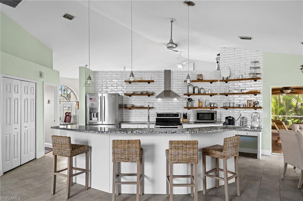 Image 17 of property listing at 411 SE 17th ST, Cape Coral, FL 33990