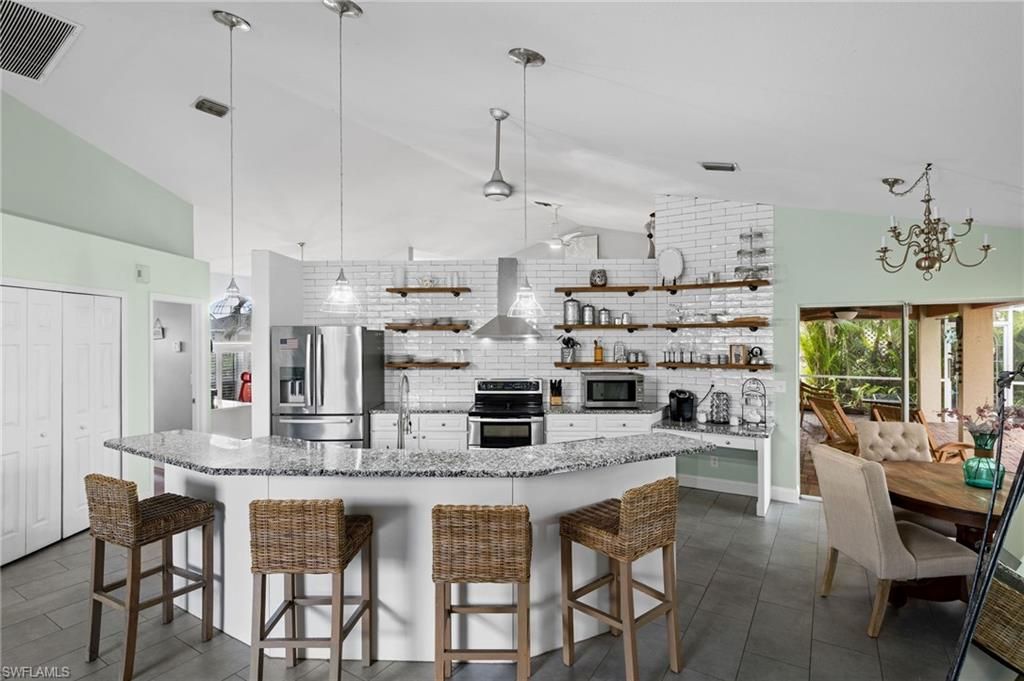 Image 18 of property listing at 411 SE 17th ST, Cape Coral, FL 33990