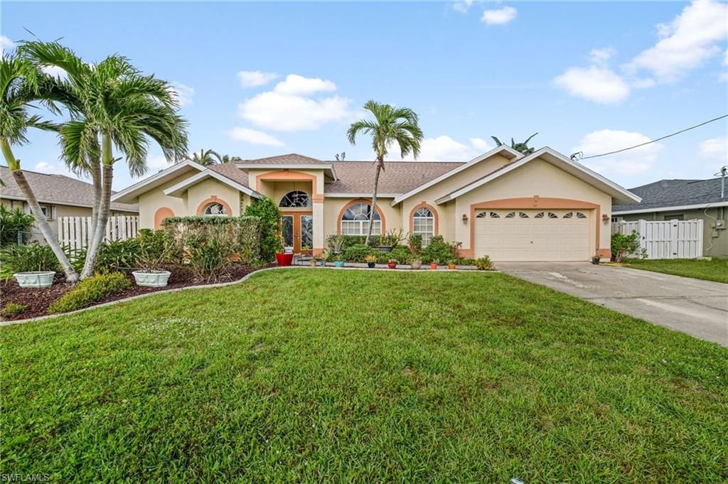 Image 3 of property listing at 411 SE 17th ST, Cape Coral, FL 33990