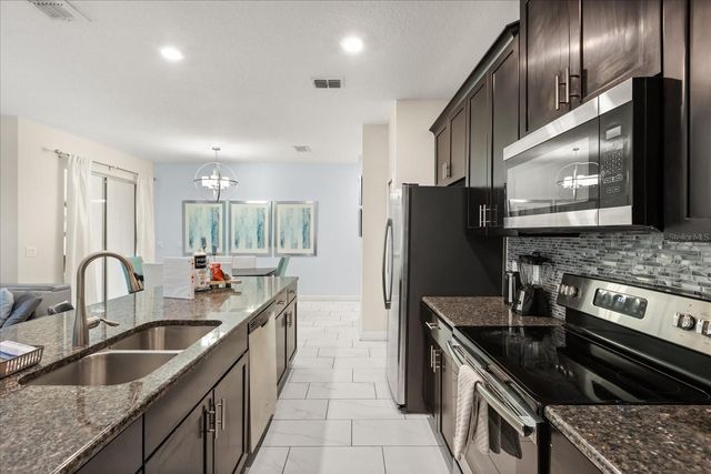 9075 DOGLEG DR, Davenport, FL 33896