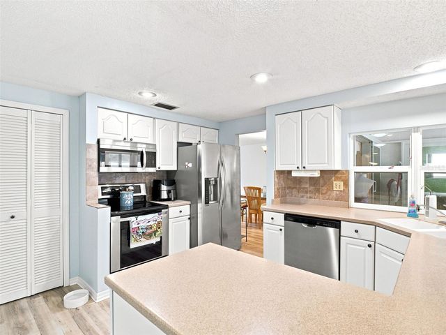 1071 PERSIMMON DRIVE, Palm Harbor, FL 34683