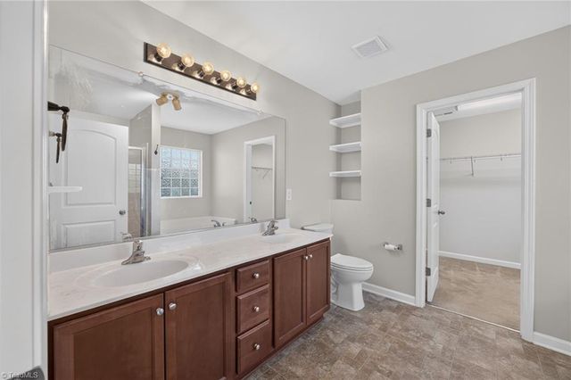 694 Trotters Run Court, Whitsett, NC 27377