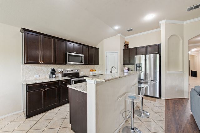 8221 Black Hills Trail, Aubrey, TX 76227