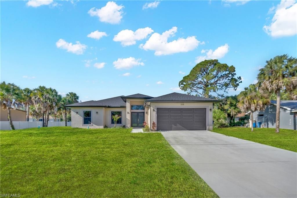 205 7th ST, LEHIGH ACRES, FL 33972 — photo 2