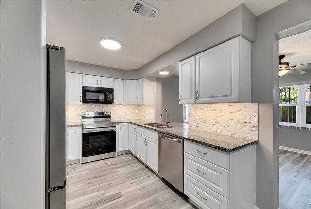 1691 E ORANGECREST AVENUE, Palm Harbor, FL 34683