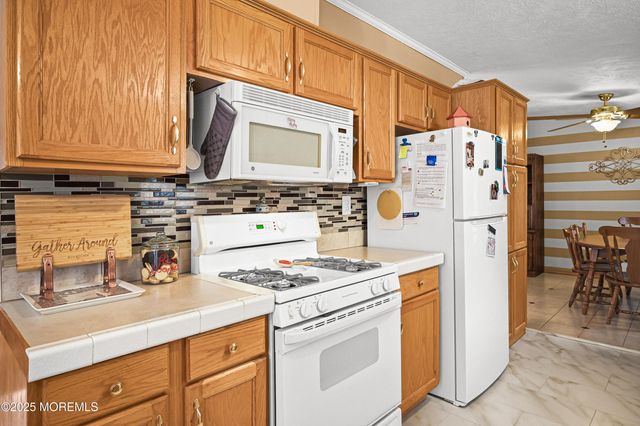 18 Village Road, Morganville, NJ 07751