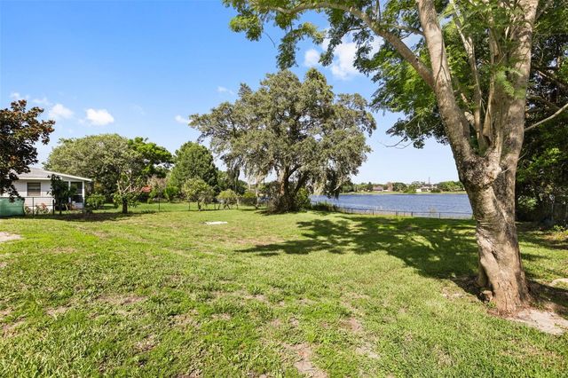 5554 PALM LAKE CIRCLE, Orlando, FL 32819