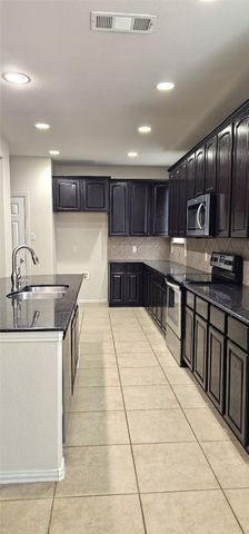 1313 Wheatear Drive, Little Elm, TX 75068