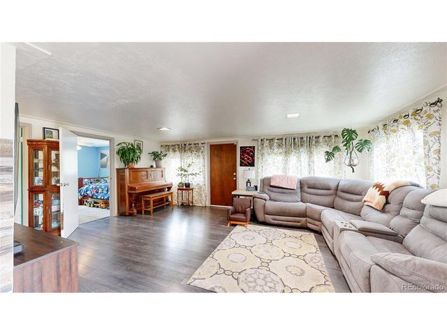 1596 Arapahoe St, Strasburg, CO 80136