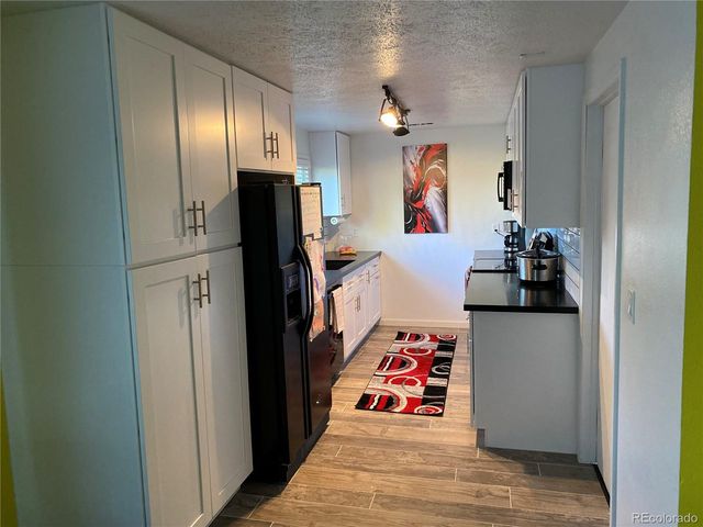 1596 Arapahoe St, Strasburg, CO 80136