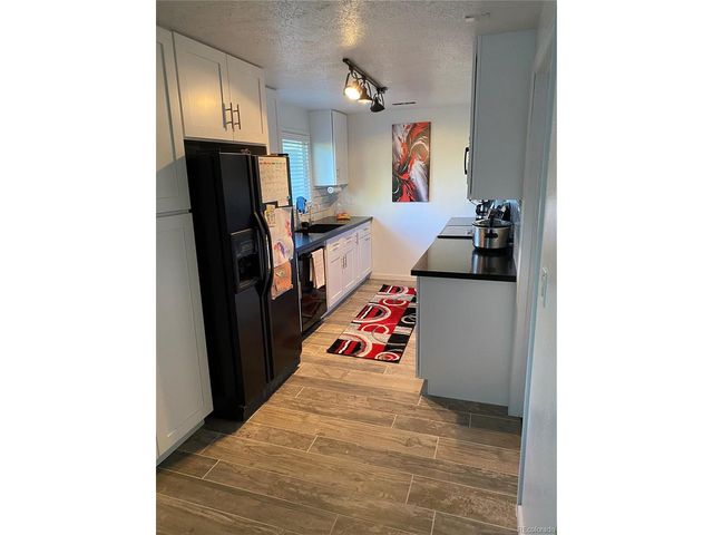 1596 Arapahoe St, Strasburg, CO 80136