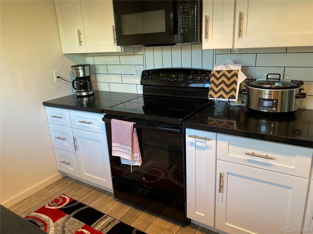 1596 Arapahoe St, Strasburg, CO 80136