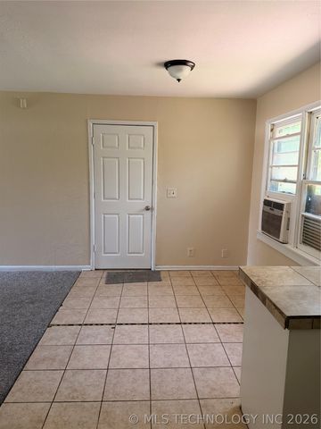647 E 52nd Place N, Tulsa, OK 74126