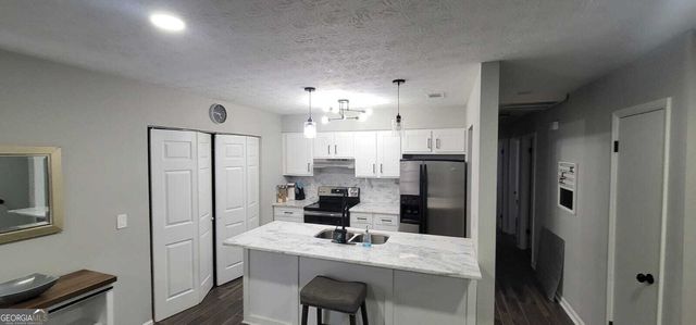 8975 Ashwood Drive, Riverdale, GA 30274