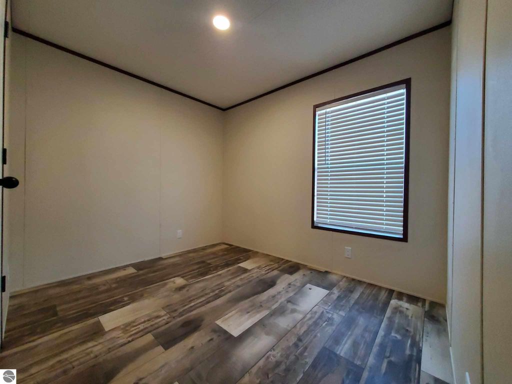 Image 16 of property listing at 8649 S Loomis Road Lot 20, Shepherd, MI 48883