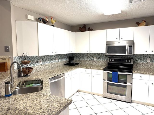 1653 Zenith Way, Weston, FL 33327