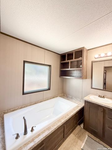 228 County Road 7711, Devine, TX 78016