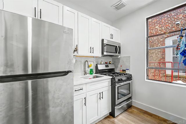98-07 37TH Avenue, Corona, NY 11368