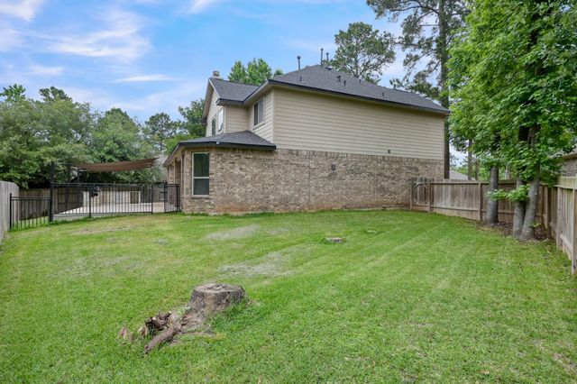 4 Logan Creek Lane, Conroe, TX 77304