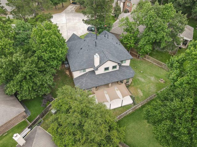 4 Logan Creek Lane, Conroe, TX 77304