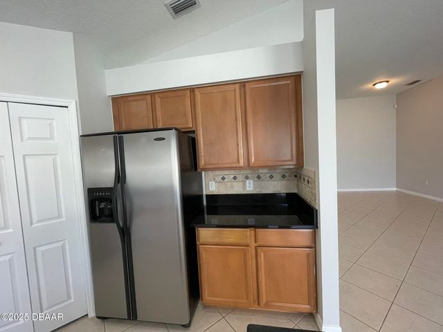 613 Coral Trace Boulevard, Edgewater, FL 32132