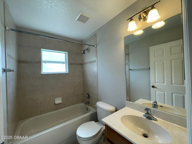 613 Coral Trace Boulevard, Edgewater, FL 32132