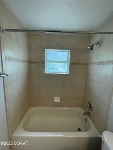 613 Coral Trace Boulevard, Edgewater, FL 32132