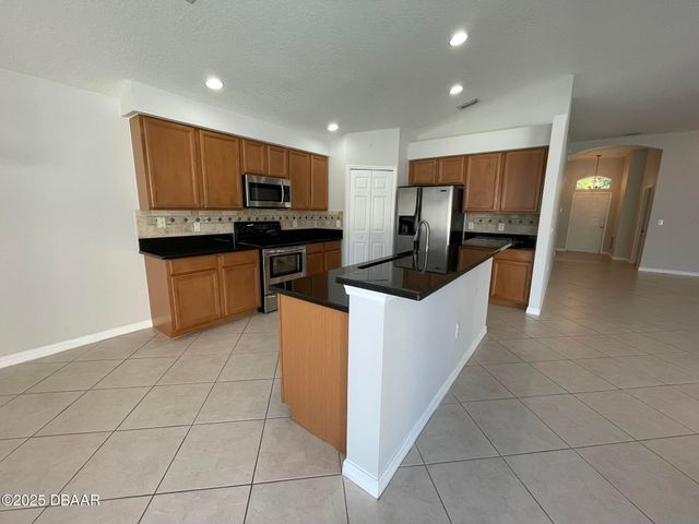 613 Coral Trace Boulevard, Edgewater, FL 32132