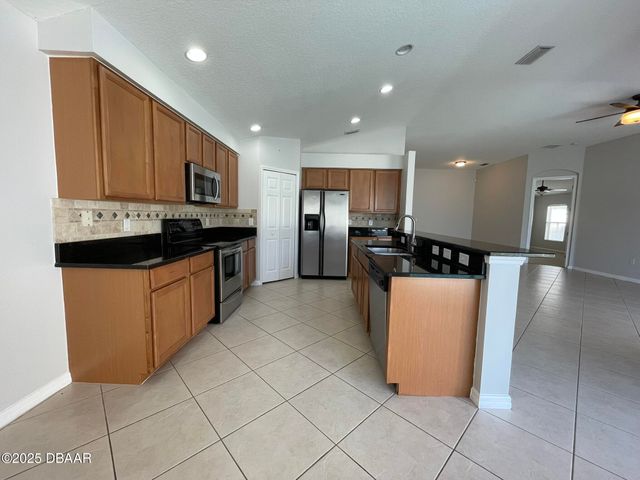 613 Coral Trace Boulevard, Edgewater, FL 32132