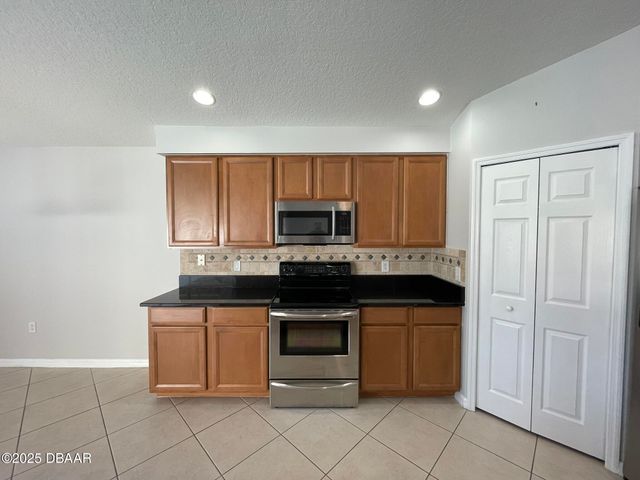 613 Coral Trace Boulevard, Edgewater, FL 32132